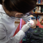 Image of a child receiving a dental exam